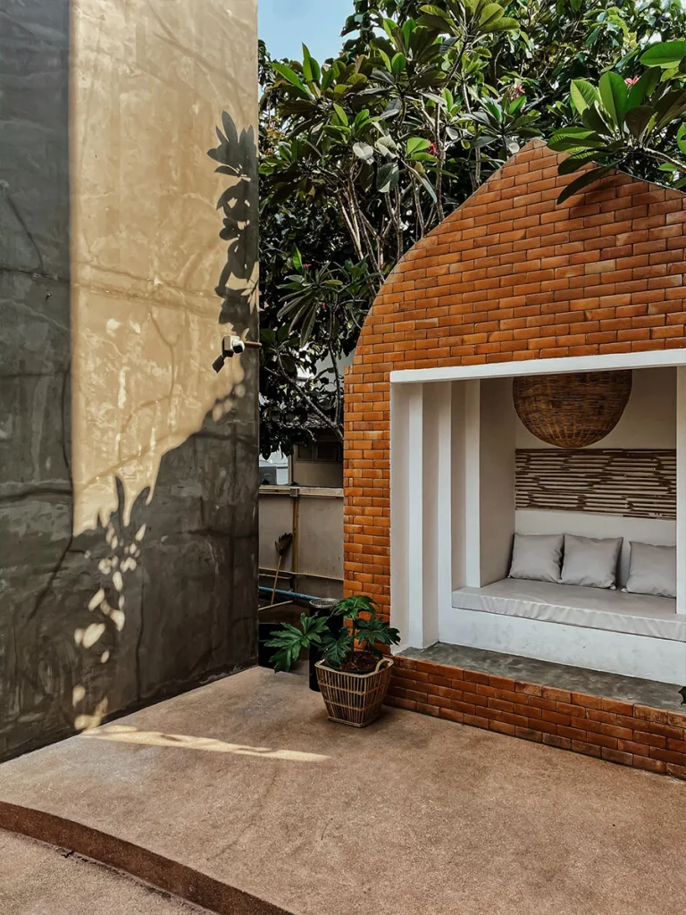 Seating nook in a brick arch at Norn Nimman13