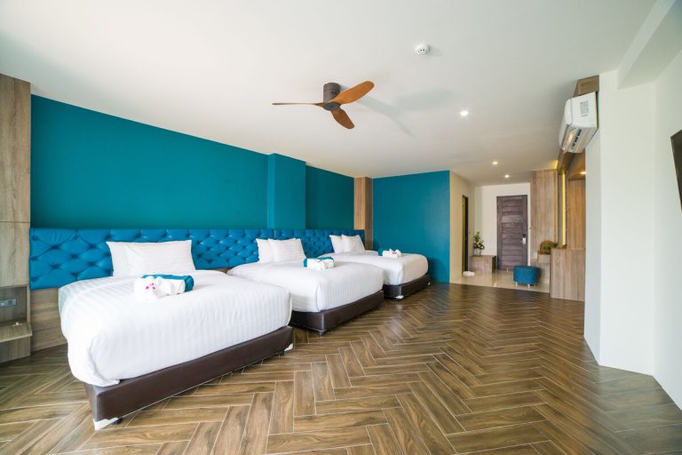 Guest room at Oceana Resort with three beds
