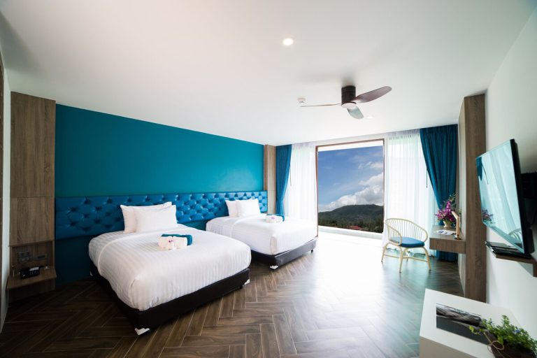 Twin room at Oceana Resort with a hill view