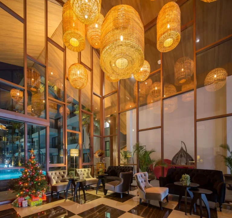 Lobby of Palmyrah Surin with rattan pendant lights